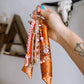Scarf & Bead Layered Bag Charm | Orange & Pink - Gold