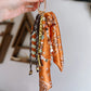 Scarf & Bead Layered Bag Charm | Orange & Brown - Gold