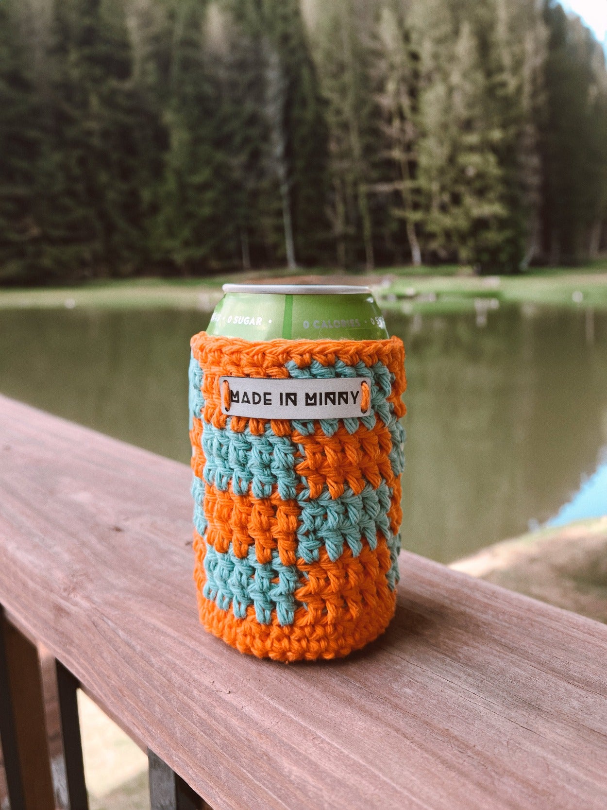 blaze orange and teal crocheted can coozie
