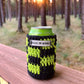 black and lime green crocheted can coozie