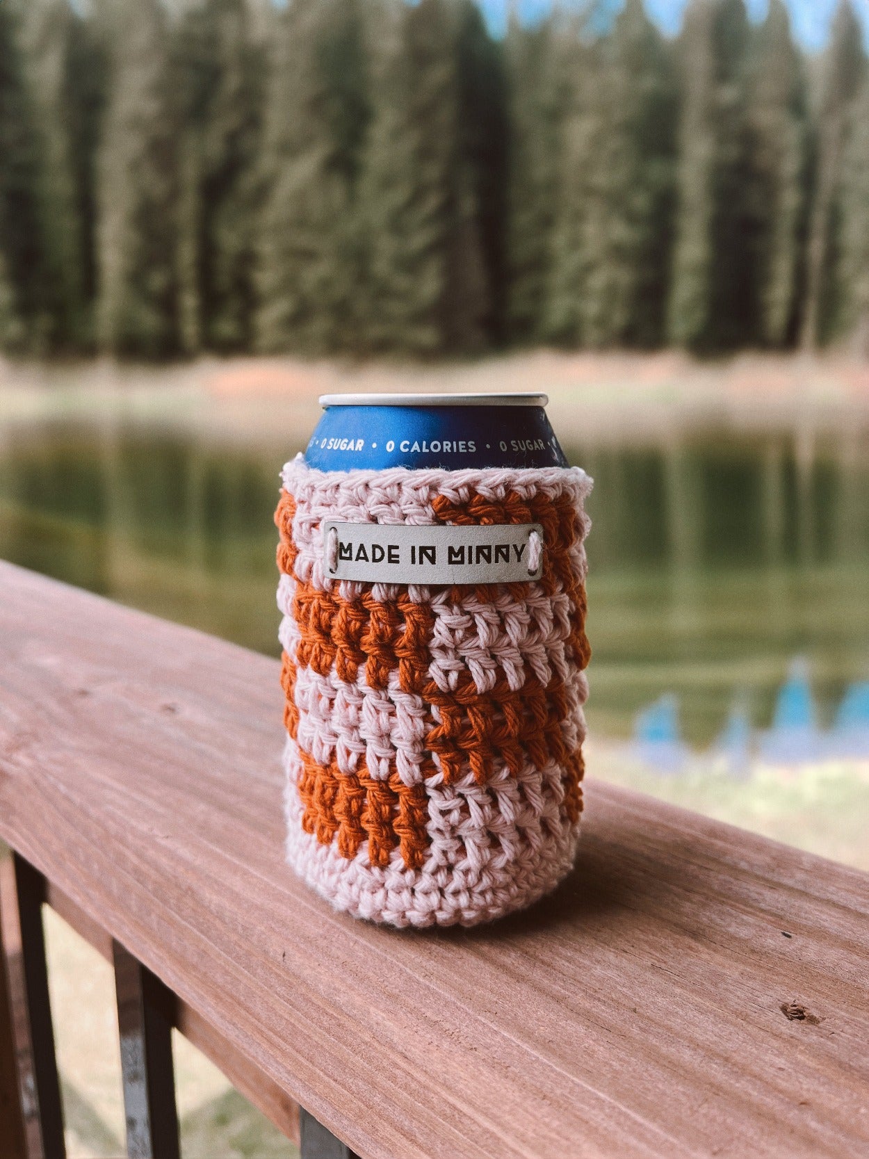 pale pink and burnt orange crocheted can coozie